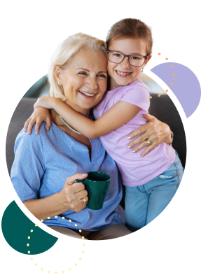 Grandmother, mother, and her daughter holding hands in a circle